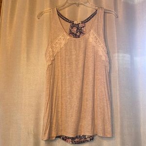 New without tags tank top with tie detail on back. Never worn
